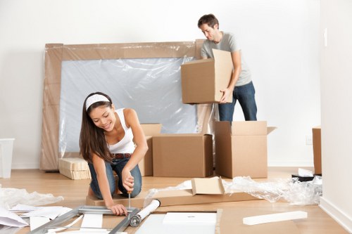 Professional removal team working in a Belgravia townhouse