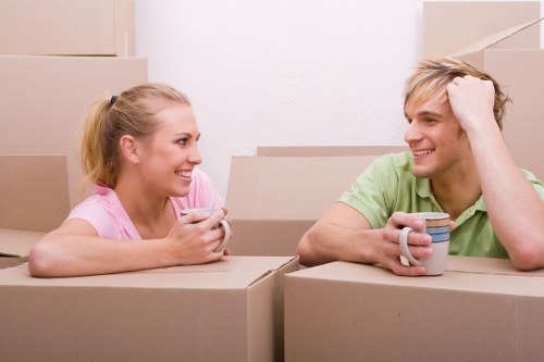 Removal team preparing items for a UK house move