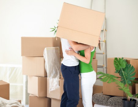 Professional movers handling office equipment in Belgravia