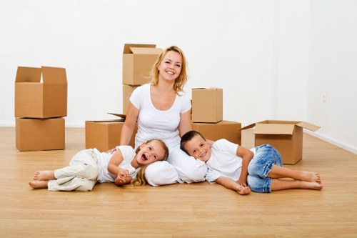 A local packing team organizing fragile household items for transport