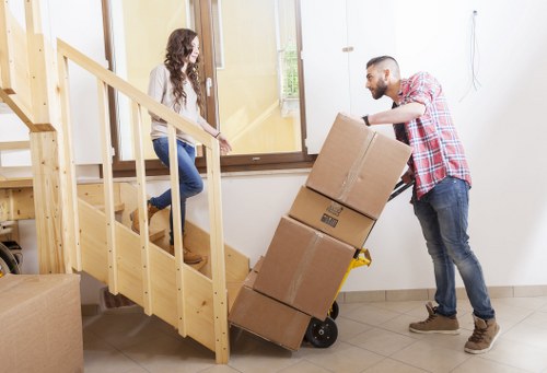 Removal team reviewing a service issue during a move