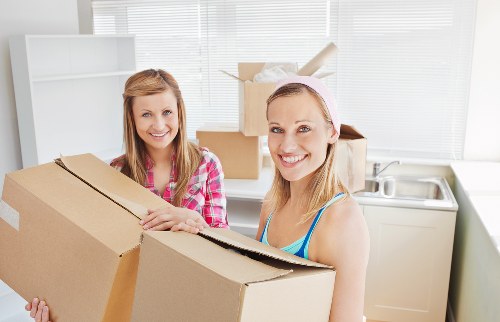 Packed office boxes and furniture ready for transport in Belgravia