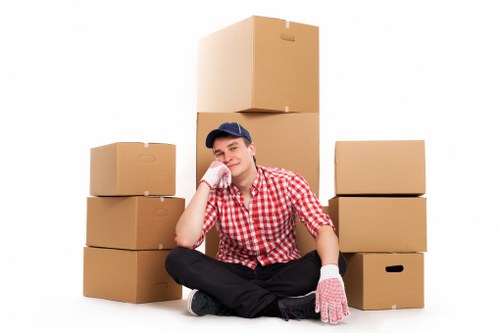 Movers handling fragile items with trained care