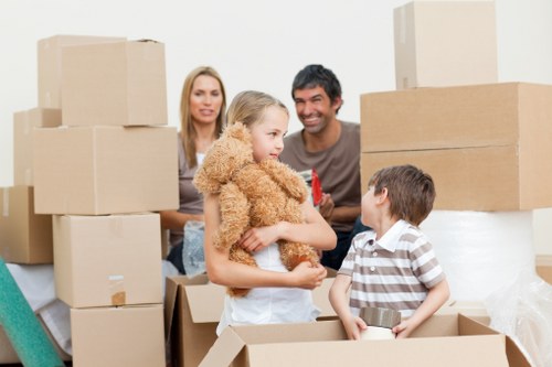 Movers packing fragile household items for a Belgravia move